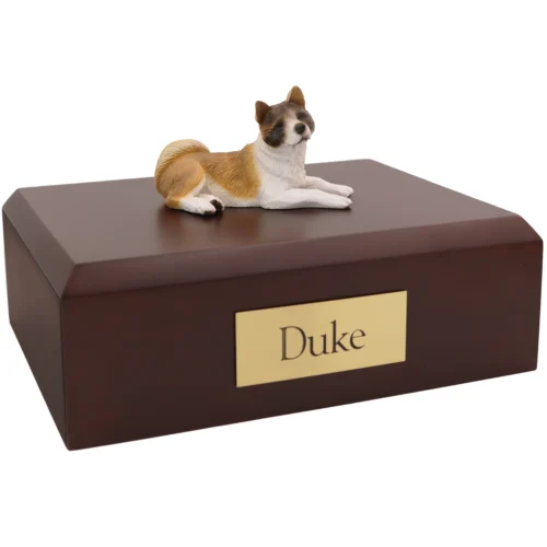 Tan & white laying akita dog figurine on wood pet cremation urn