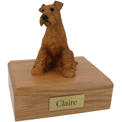 Memorial cremation oak finish urn with sitting airedale terrier dog figurine