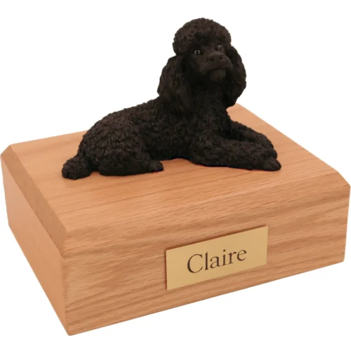 Laying black poodle dog figurine wood memorial cremation urn