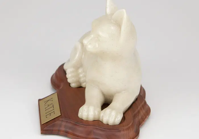 Stone and Resin Porcelain-style Cat Cremation Urn with base, laying