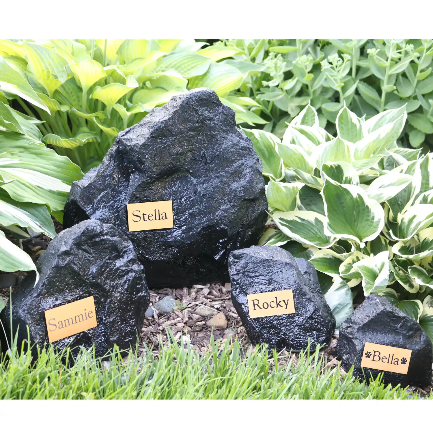 Rock memorial cremation urns, all sizes, in outdoor use setting
