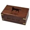 Small rosewood dog urn with engraved front and silhouette, black fill