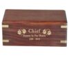 Small rosewood urn with engraved wood front, gold fill