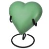 Engraved brass heart cremation urn, sage green, with stand