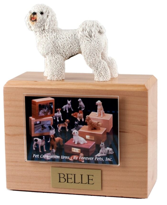 Bichon Frise figurine atop hardwood photo holder dog urn