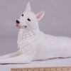 White German Shepherd pet dog cremation urn figurine, with ruler