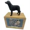 Black Labrador dog figurine atop wood memorial photo holder cremation urn