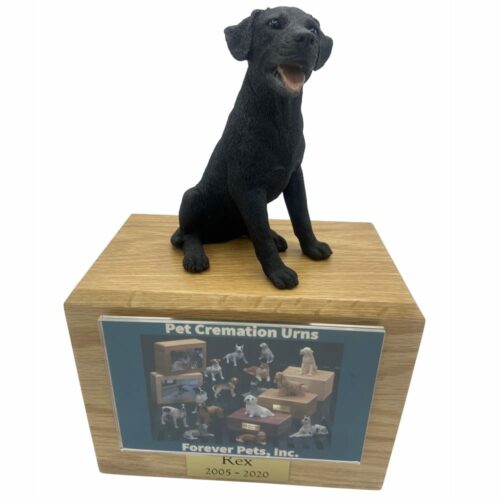 Black Labrador dog figurine atop wood memorial photo holder cremation urn