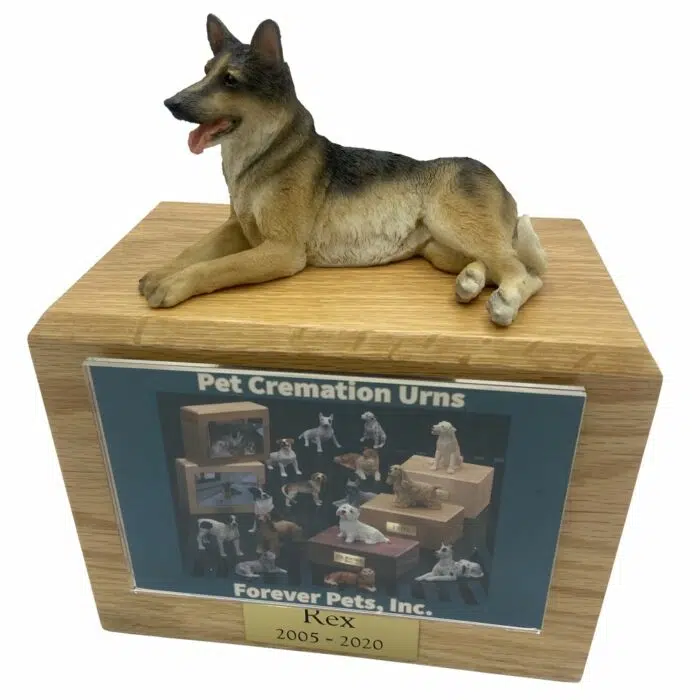 German Shepherd dog figurine atop wood memorial photo holder cremation urn