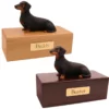 Budget dog figurine cremation urn, oak or walnut, with black Dachshund figurine, engraved brass plaque