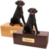 Budget dog figurine cremation urn, oak or walnut, with black labrador retriever figurine, engraved brass plaque