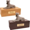 Budget dog figurine cremation urn, oak or walnut, with laying silver Schnauzer figurine, engraved brass plaque