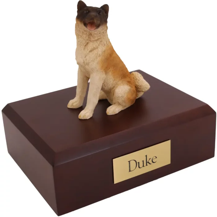 Memorial cremation urn with sitting Japanese akita dog figurine