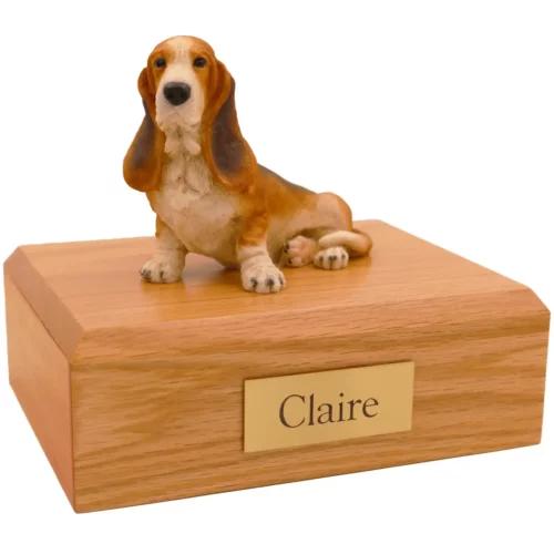 Memorial cremation urn with sitting basset hound dog figurine