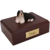 Memorial cremation urn with laying bearded collie dog figurine