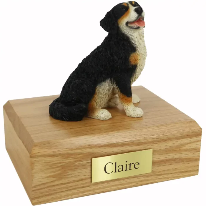 Memorial cremation urn with sitting bernese mountain dog figurine