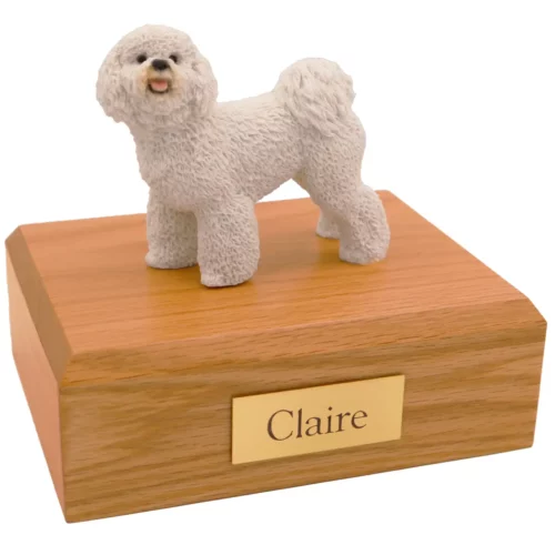 Memorial cremation urn with standing white bichon frise dog figurine