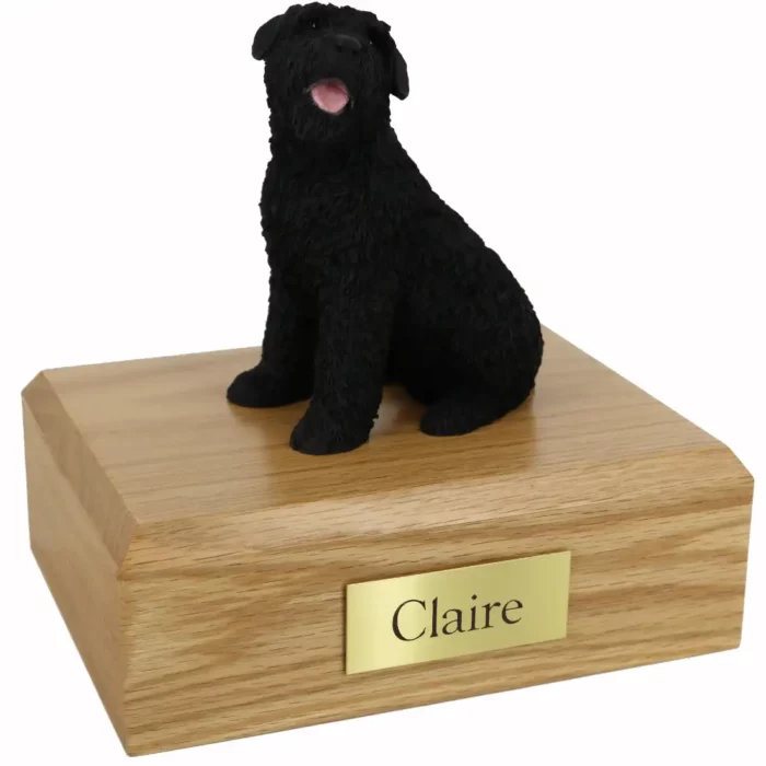 Memorial cremation urn with sitting bouvier dog figurine