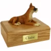 Memorial pet cremation urn with laying ears up boxer dog figurine