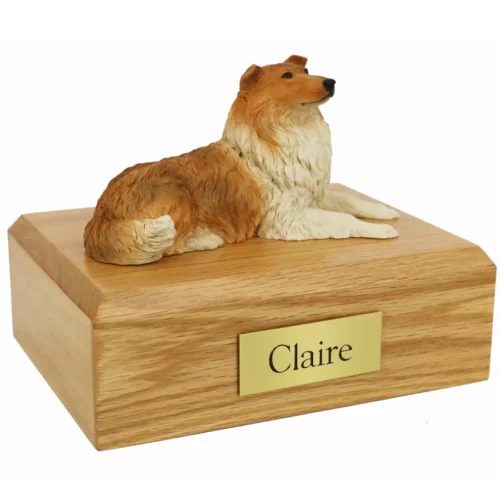 Memorial pet cremation urn with laying collie dog figurine