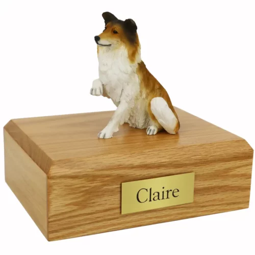 Memorial pet cremation urn with sitting paw up collie dog figurine