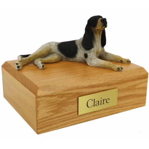 Memorial pet cremation urn with laying coonhound dog figurine