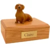 Memorial pet cremation urn with sitting red brown dachshund dog figurine