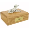 Memorial pet cremation urn with laying Dalmatian dog figurine