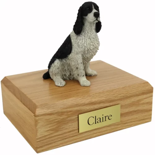 Memorial pet cremation urn with black & white springer spaniel dog figurine