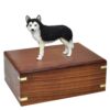 Husky dog figurine cremation urn, black and white with brown eyes