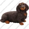 Black longhaired Dachshund dog figurine for memorial urn, front