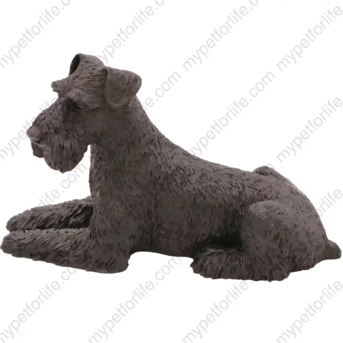 Laying Black Schnauzer dog figurine for memorial urn, side