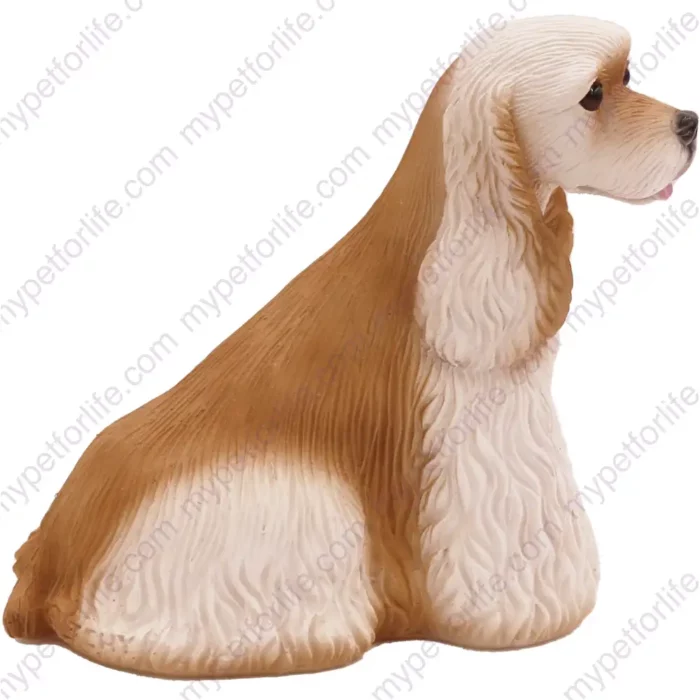 Sitting buff and white Cocker Spaniel dog figurine for memorial urn, front