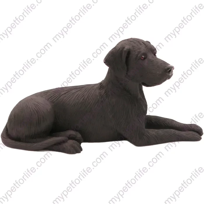 Laying black Labrador Retriever dog figurine for memorial urn, side