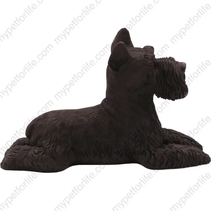 Laying ears up Black Schnauzer dog figurine for memorial urn, side