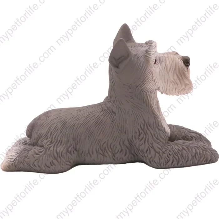 Laying ears up Gray Schnauzer dog figurine for memorial urn, side