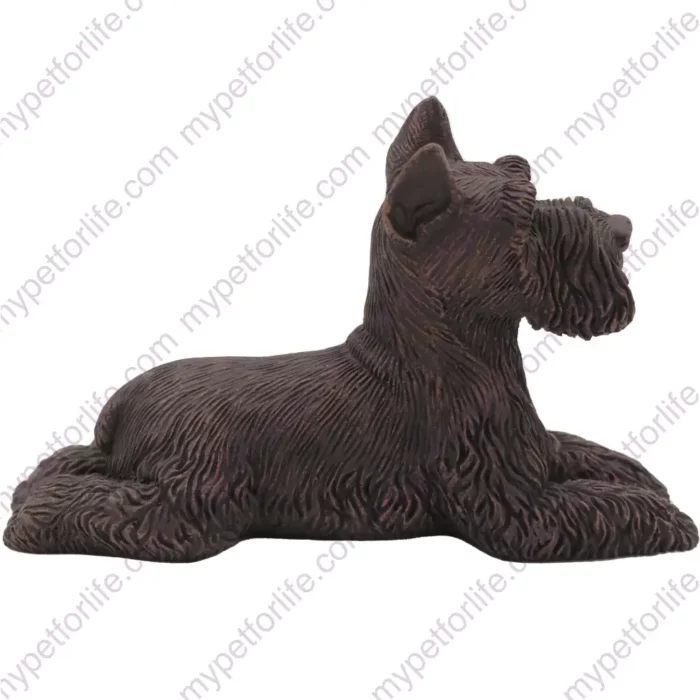 Laying ears up Bronze Schnauzer dog figurine for memorial urn, side