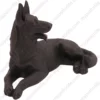 Laying black German Shepherd dog figurine for memorial urn, side