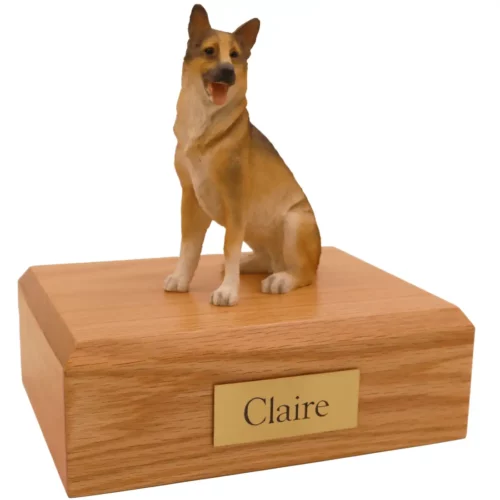 Sitting german shepherd dog figurine on wood memorial cremation urn