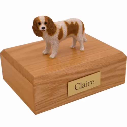 Standing King Charles Spaniel dog figurine on wood memorial cremation urn