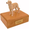 Standing yellow labrador retriever dog figurine on wood memorial cremation urn