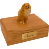 Sitting brown pomeranian dog figurine on wood memorial cremation urn