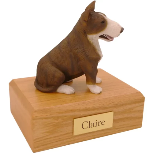 Sitting brindle & white pit bull dog figurine on wood memorial pet cremation urn