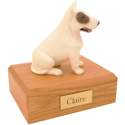 Sitting white pit bull dog figurine on wood memorial pet cremation urn