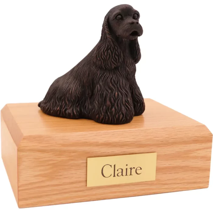 Sitting bronze look cocker spaniel dog figurine on wood memorial pet cremation urn