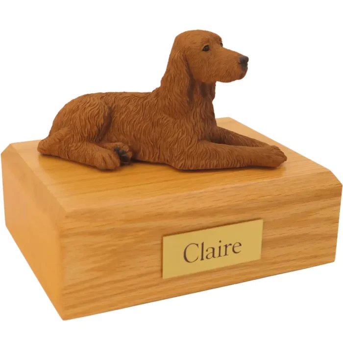 Laying Irish Setter dog figurine on wood memorial pet cremation urn