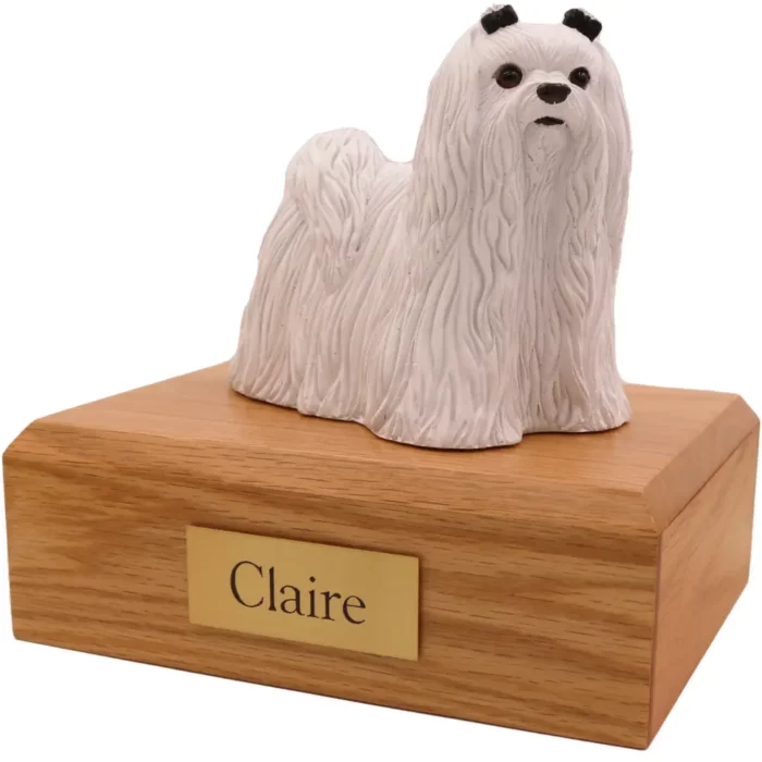 Standing white Maltese dog figurine on wood memorial pet cremation urn