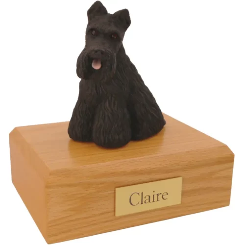 Sitting black Scottish Terrier dog figurine on wood memorial pet cremation urn