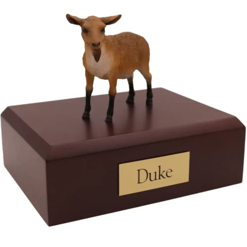 Brown goat figurine on wood memorial pet cremation urn