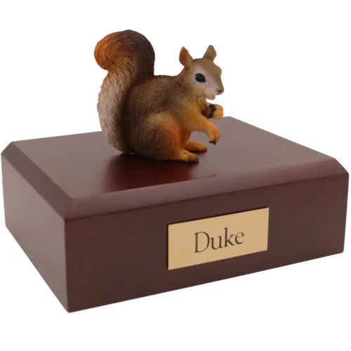 Squirrel figurine on wood memorial pet cremation urn